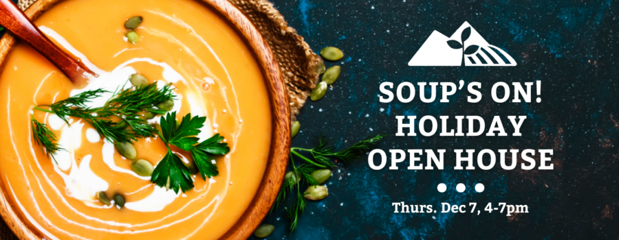 A brown bowl full of orange soup with a white drizzle and green leafy garnish with a wooden spoon set on top of a brown burlap napkin on a blue table sprinkled with pumpkin seeds. The words 'soups on! holiday open house, Thursday December 7, 4-7pm' overlay the picture.