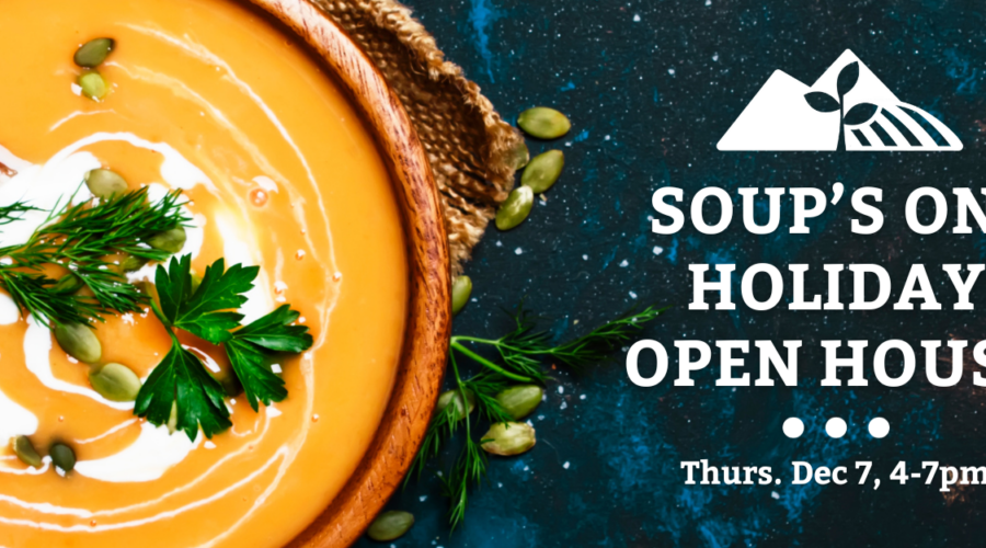 A brown bowl full of orange soup with a white drizzle and green leafy garnish with a wooden spoon set on top of a brown burlap napkin on a blue table sprinkled with pumpkin seeds. The words 'soups on! holiday open house, Thursday December 7, 4-7pm' overlay the picture.